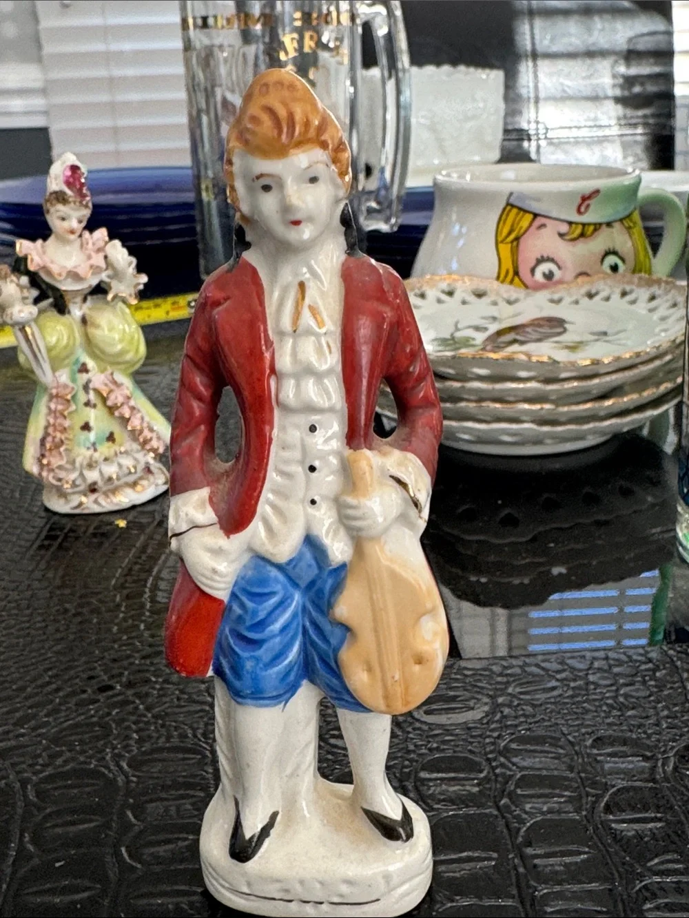 Source Unknown Porcelain Figurines in White, Red, Green, Blue, Tan